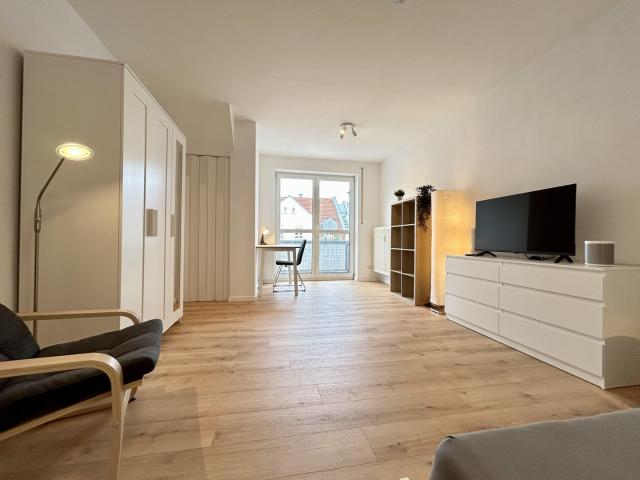 Stylisches 1 Zimmer Apartment mit Balkon & Tiefgarage – Möbliert, vollausgestattet & all inclusive!