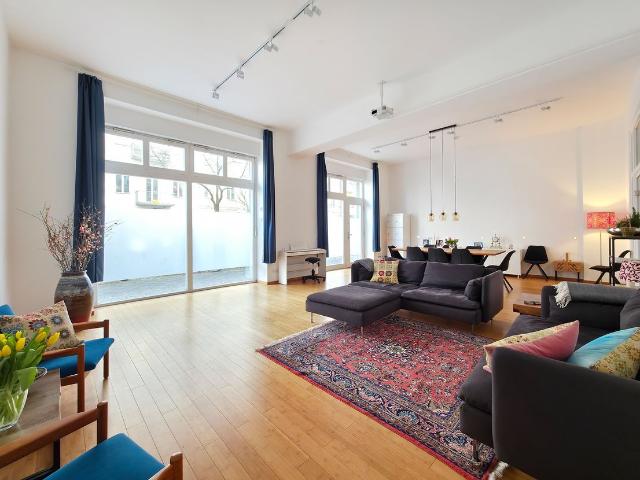 Stylish apartment with loft character, underfloor heating, and garden access in Berlin Mitte