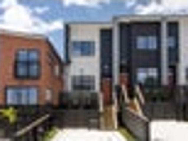 Stylish End Townhouse with Two Bedrooms & Parking
