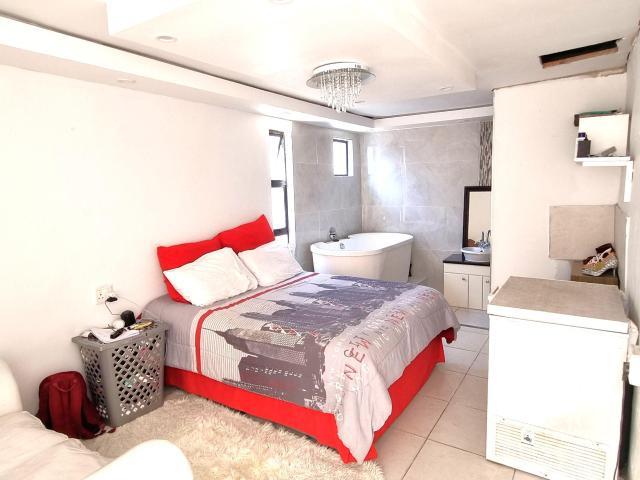 Stylish family home with a personal touch and four flatlets!