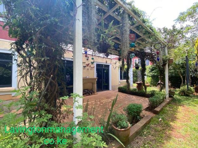 Stylishly designed 5 bedrooms townhouse plus family rm and dsq in a gated community with 24hrs security