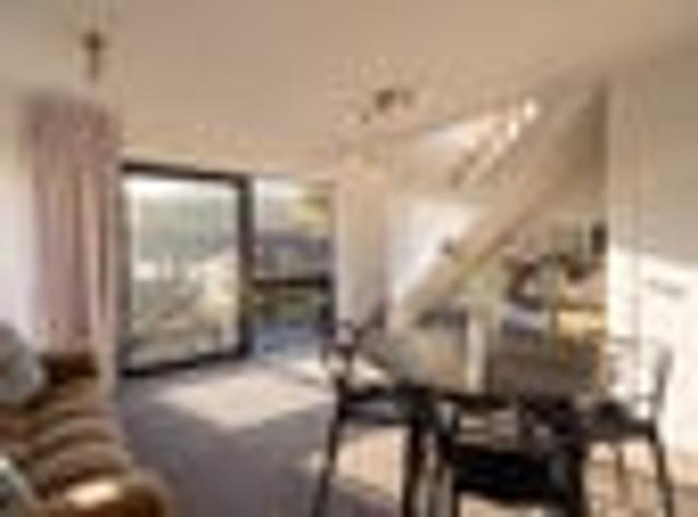 SUN DRENCHED CORNER TOWNHOUSE WITH GARAGE
