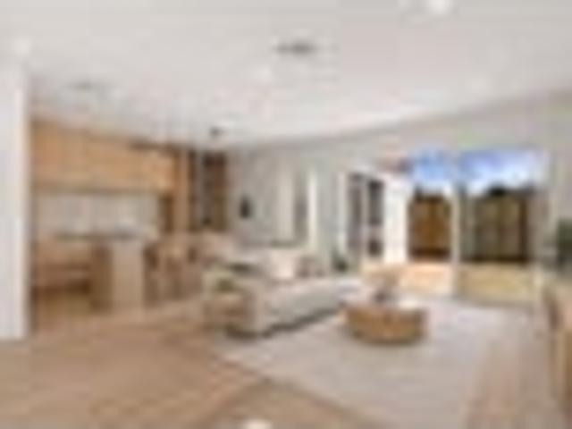 Sun Filled Corner Home with Dual Kitchens