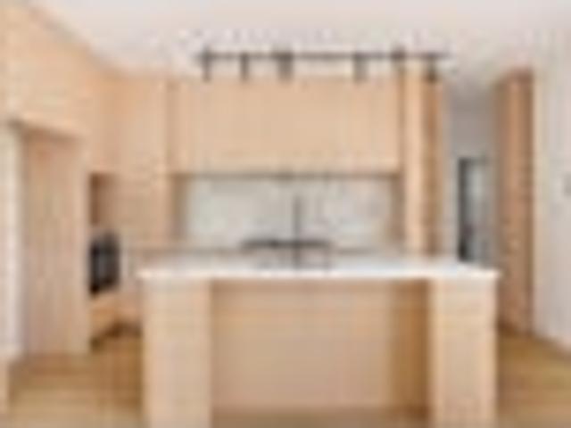 Sun Filled Corner Home with Dual Kitchens
