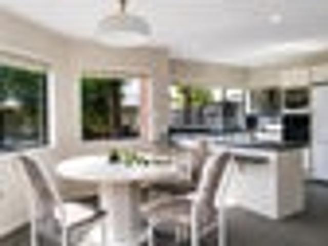 Sun Filled Family Oasis with Future Potential