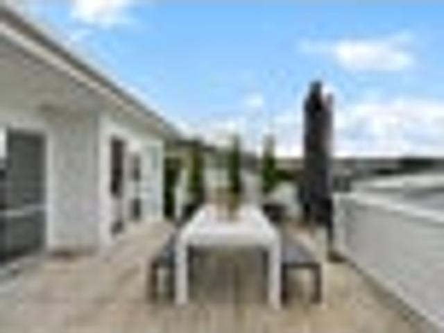 Sun soaked family living on a freehold title
