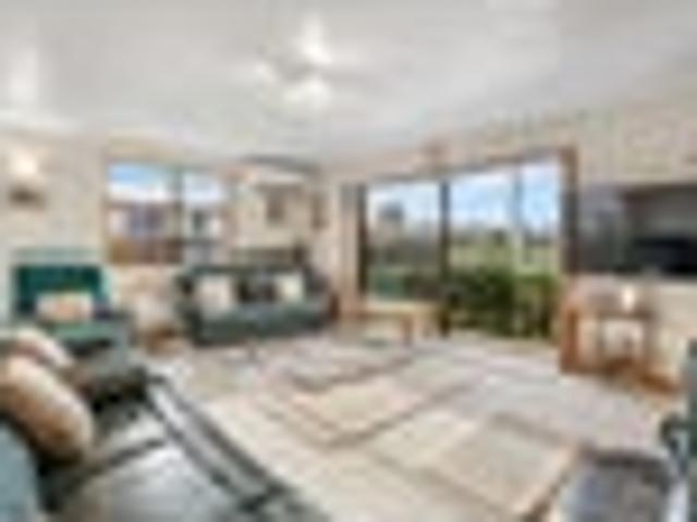 Sun soaked family living with generous garaging