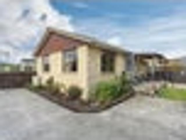 Sun soaked family living with generous garaging