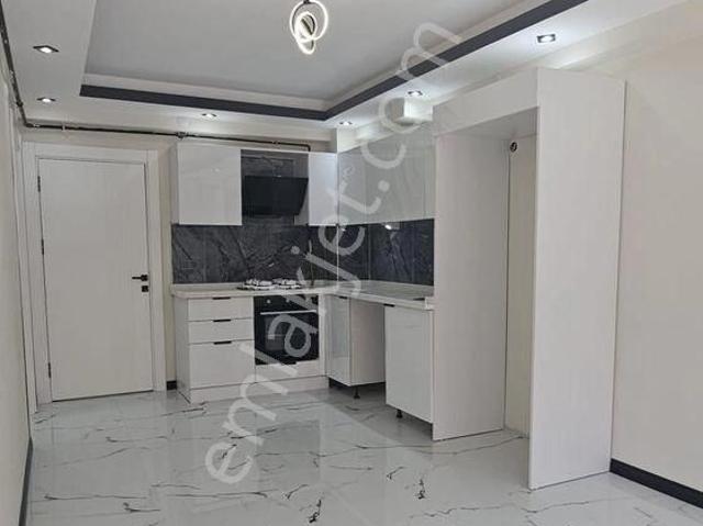 Sünbül İnşaat Emlak'tan Z.ısıtma Lüx Kiralık 1+1