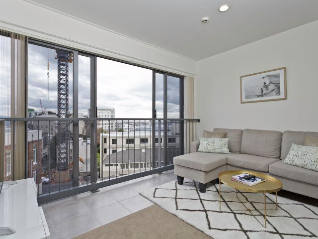 Sunlit City Living: Spacious Three Bedroom Gem on Queen Street