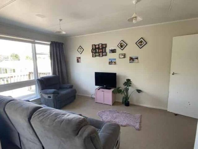 Sunny and Elevated Three Bedroom Home