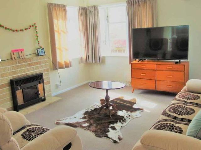 Sunny large family home close to train station