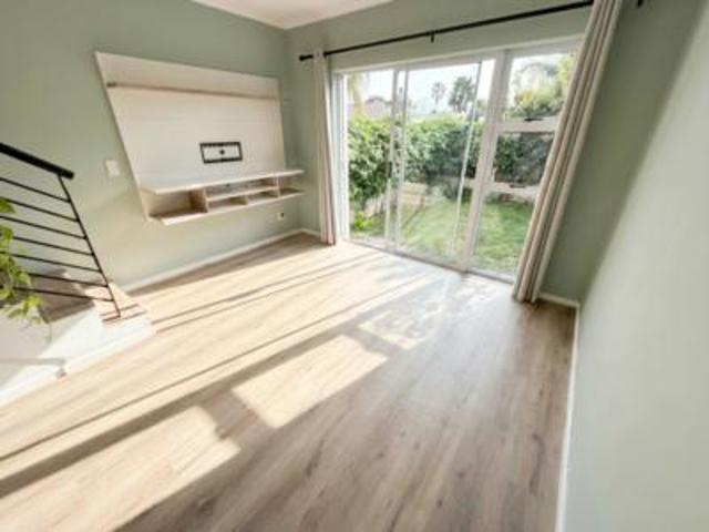 sunny renovated duplex with private garden