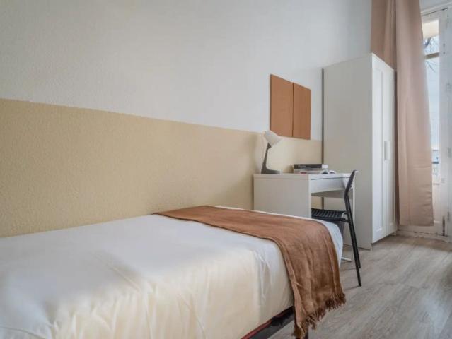 Sunny room with balcony in shared apartment, Chamberí
