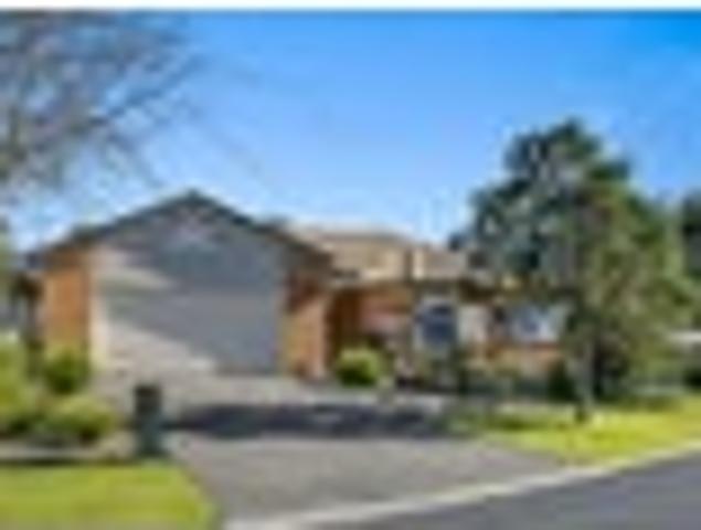 Sunny single level in sought after setting