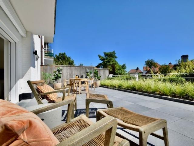 Subliem tuinappartement met zonneterras van 72m2 in een k.