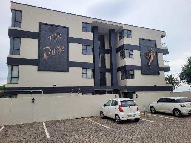 Super neat well maintained beachfront apartment with all high quality furniture and appliances incl