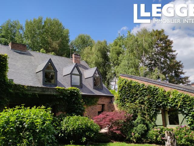 Superbe maison familiale de 6 chambres, conçue par un architecte, située dans 11 000 m2 de jardin et de pâture