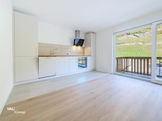 Superbe appartement neuf avec balcon au coeur du village