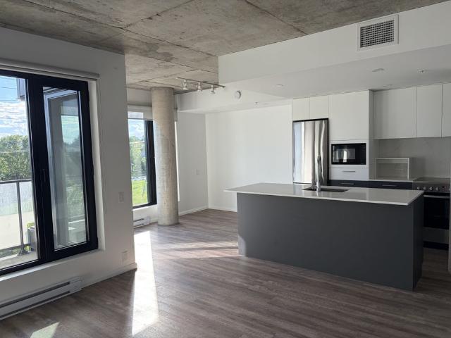 Superbe condo 3 1/2, parking intérieur, tout inclus !