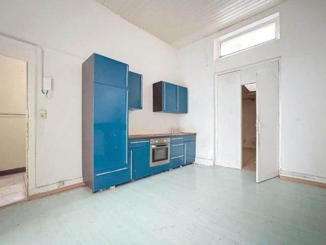 Superbe duplex + jardin à rénover
