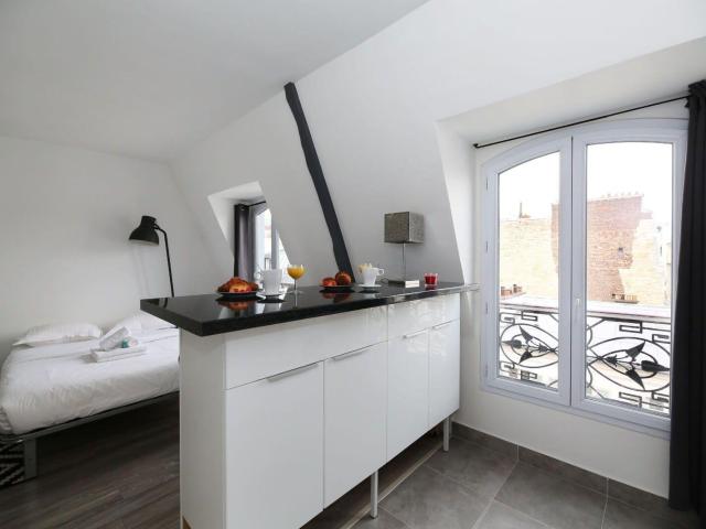 Superbe studio meublé 23m² proche marché Poncelet