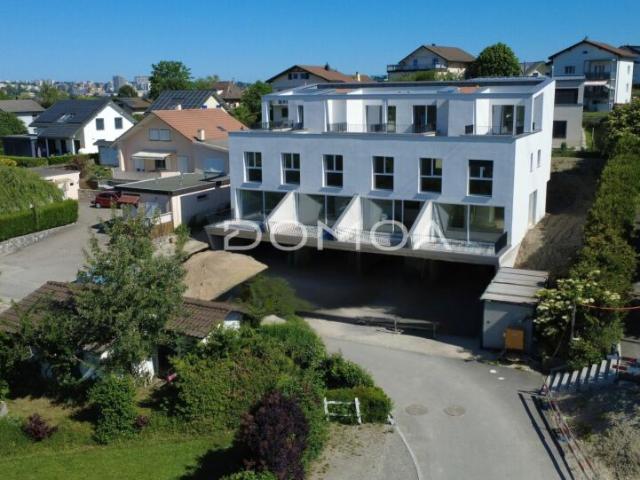 Superbes villas mitoyennes avec terrasses et jardin D