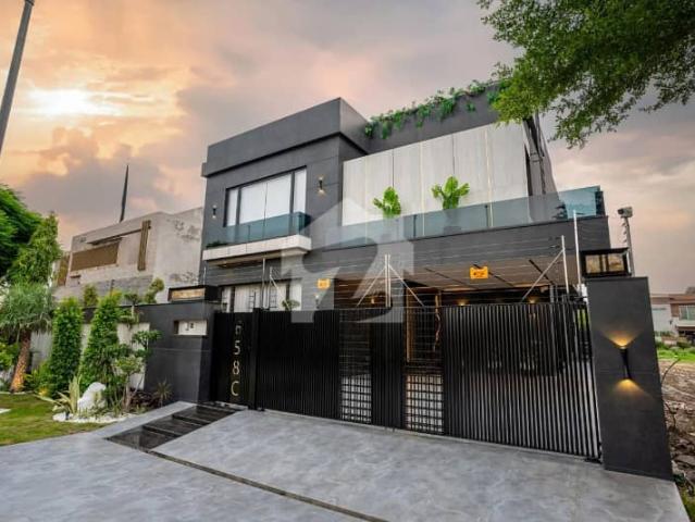 SYED BROTHERS PROUDLY OFFERS: 1 Kanal Elegant And Fully Furnished Bungalow with Basement and Swimming Pool Is Available In The Best Block Of DHA Lahore | Near to Dolmen Mall & Ring Road