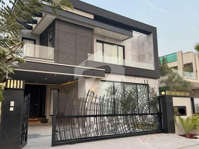 SYED BROTHERS PROUDLY OFFERS: 1 Kanal Elegant And Fully Furnished Bungalow with Basement & Swimming Pool Near Commercial and Dolmen Mall Is Available In The Best Block Of DHA Lahore
