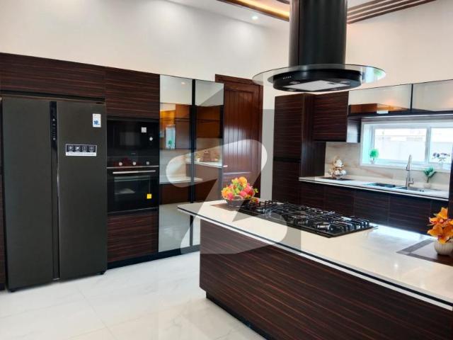 SYED BROTHERS PROUDLY OFFERS: 1 Kanal Elegant And Fully Maintained Modern Brand New Bungalow Is Available In The Best Block Of DHA Lahore. DHA Phase 7 Block Y