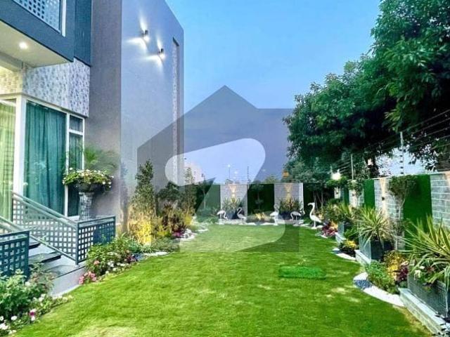 SYED BROTHERS PROUDLY OFFERS: 2 Kanal Elegant And Fully Furnished Modern Bungalow with Basement, Swimming Pool Is Available In The Best Block Of DHA Lahore