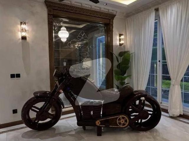 SYED BROTHERS PROUDLY OFFERS: 2 Kanal Elegant And Fully Furnished Bungalow With Basement & Swimming Pool Is Available In The Best Block Of DHA Lahore. DHA Phase 6 Block G